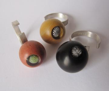 Ring 91 - Pink Ivory wood with Emerald Nerite : $110
